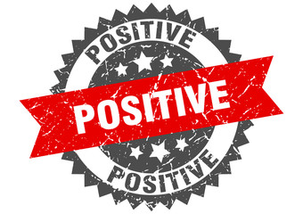positive grunge stamp with red band. positive