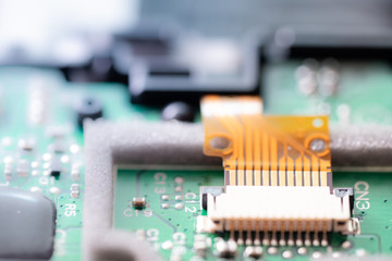Connector or Socket and cable on the motherboard or electronic board.