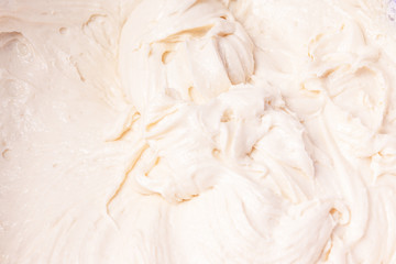 Culinary background - kneading dough for baking close-up, beige tint