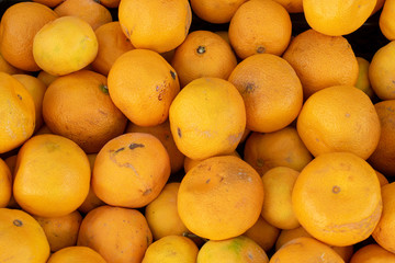 many fresh raw orange
