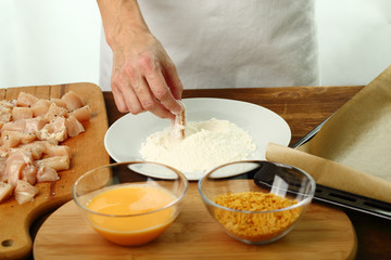 Roll chicken fillet in flour