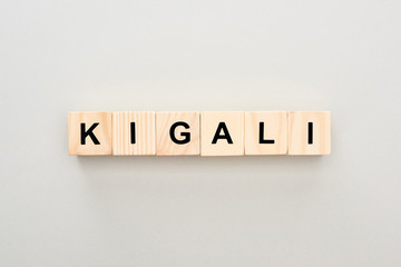 top view of wooden blocks with Kigali lettering on grey background