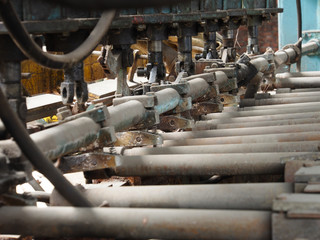 Details and fragments of Metalworking machines in an abandoned factory, close-up.