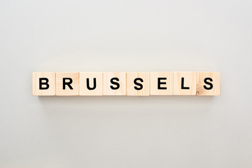 top view of wooden blocks with Brussels lettering on grey background
