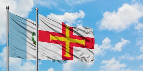 Guatemala and GuernseyGuernsey, Guernsey flag, channel islands, guern flag waving in the wind...