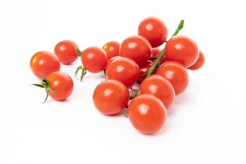 Cherry tomatoes isolated on white background