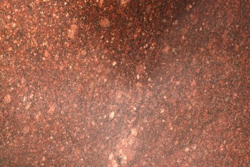 Background.Texture. Natural polished stone . Red granite.