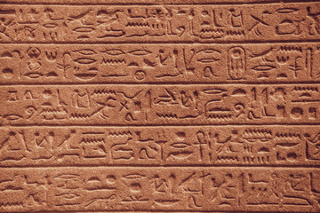 close up of Egyptian hieroglyphs on the wall