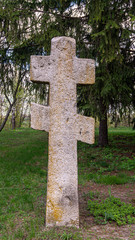 Old Russian stone crosses in a cemetery