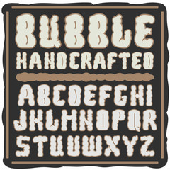 Original label typeface called "Bubble". Good handcrafted font for any label design.