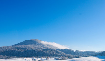 Beautiful alpine panoramic view snow capped mountains, European beautiful winter mountains in Alps, Slope for cross country skiers in landscape