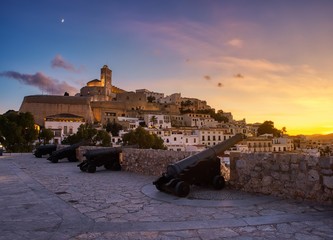 beautiful sunset in the historic area of Dalt Vila in Ibiza,Balearics,Spain.Cathedral and white houses in the wall area