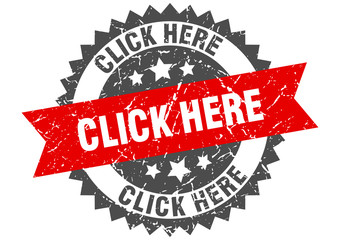 Obraz premium click here grunge stamp with red band. click here