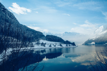 Fototapeta na wymiar Panoramic view of beautiful white winter in the Alps