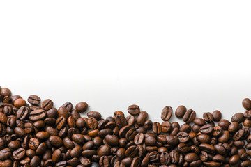Fresh coffee beans on a white background