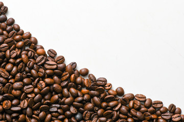 Fresh coffee beans on a white background