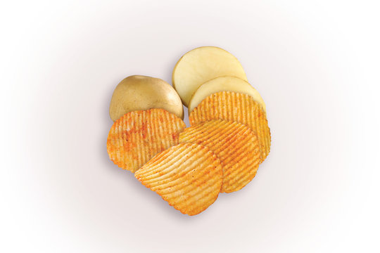 Potato slices turning into chips isolated, Crispy potato chips, salted chips, masala chips (wafers), namkeen, on white background, selective focus - Image