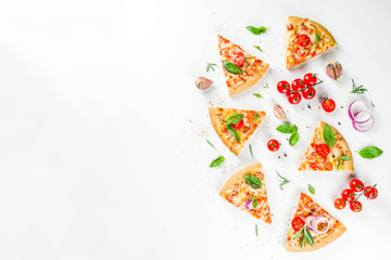 Pieces of cheese pizza Margarita with ingredients and herbs. White stone background top view