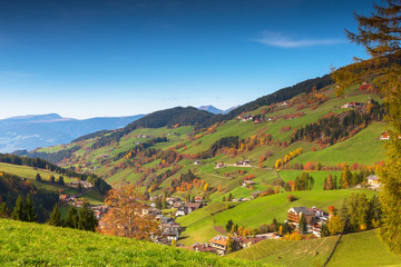 Fototapeta na wymiar Idyllic scenery of the Santa Maddalena village in South Tyrol at autumn. Italy