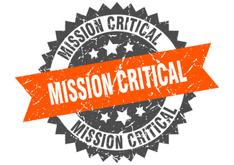 mission critical grunge stamp with orange band. mission critical
