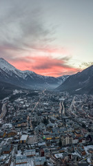 Aerial drone view of red evening glow over Chamonix Mont Blanc, in French Alps