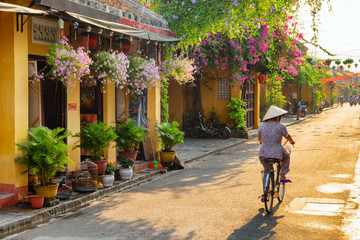 Amazing view of old street in Hoi An at sunrise - obrazy, fototapety, plakaty