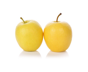 Ripe yellow apple isolated on white
