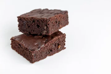 Vegan brownies chocolate plant based diet no animal products on dark background © graham