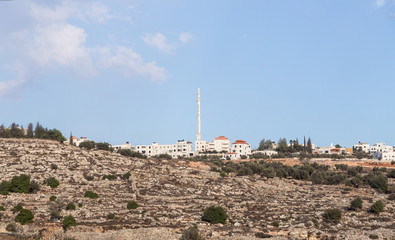 View from the highway number 5 high mosque with in Palestinian village Silwad located on a hill in Samaria region in Benjamin district, Israel - obrazy, fototapety, plakaty