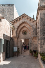 Fototapeta na wymiar The courtyard of Monastery Carmel Pater Noster is located on Mount Eleon - Mount of Olives in East Jerusalem in Israel