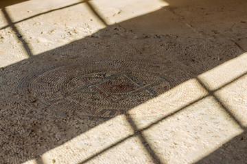 Mosaic Six-pointed Star of David on the floor of the reconstructed building of the Byzantine era in the archaeological site Ancient Shiloh in Samaria region in Benjamin district, Israel - obrazy, fototapety, plakaty