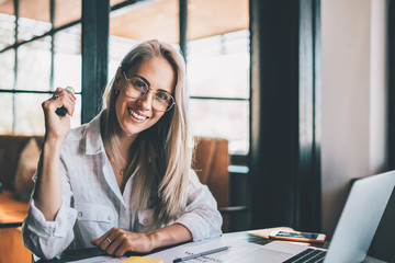 Charming casual woman with laptop