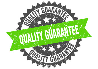 quality guarantee grunge stamp with green band. quality guarantee