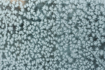  Texture of hoarfrost on the window. Frosty pattern on the glass.