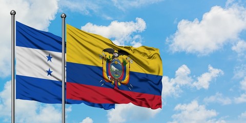 Honduras and Ecuador flag waving in the wind against white cloudy blue sky together. Diplomacy concept, international relations.