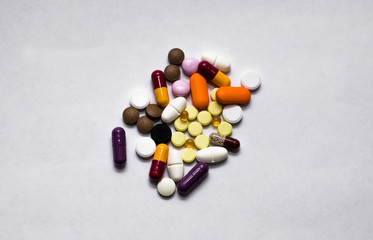 Medical pills on white background