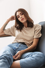 Fototapeta premium Concentrated young amazing woman posing indoors
