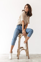 Beautiful woman posing indoors isolated