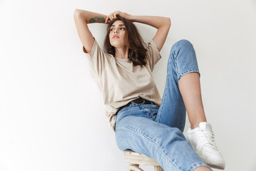 Beautiful woman posing indoors isolated
