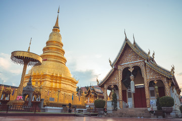 Fototapeta na wymiar Wat Phra That Hariphunchai,Lamphun Province,Thailand,beautiful golden pagoda Lanna style