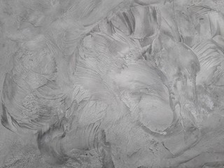 Gray cement walls are suitable for making a construction industry background.