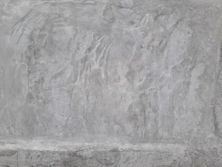 Gray cement walls are suitable for making a construction industry background.