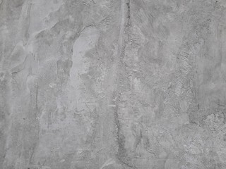 Gray cement walls are suitable for making a construction industry background.