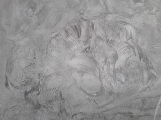 Gray cement walls are suitable for making a construction industry background.