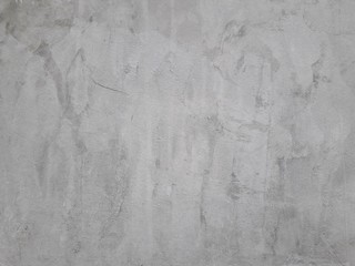 Gray cement walls are suitable for making a construction industry background.