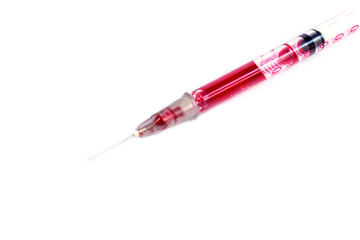 Fototapeta premium Plastic syringe on white background