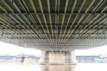 Steel frame scaffolding at the bridge renovation work on the river