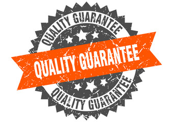 Fototapeta premium quality guarantee grunge stamp with orange band. quality guarantee