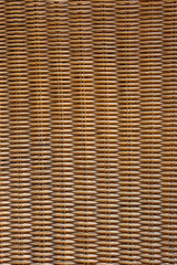 the dark brown  wooden texture of rattan with natural patterns