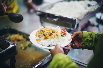 Food donation to the poor in human society : the concept of helping each other